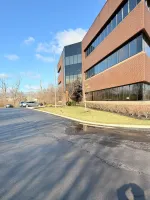 Trimmed beds and lawn at an office building