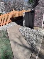 River rock beds along a side walkway